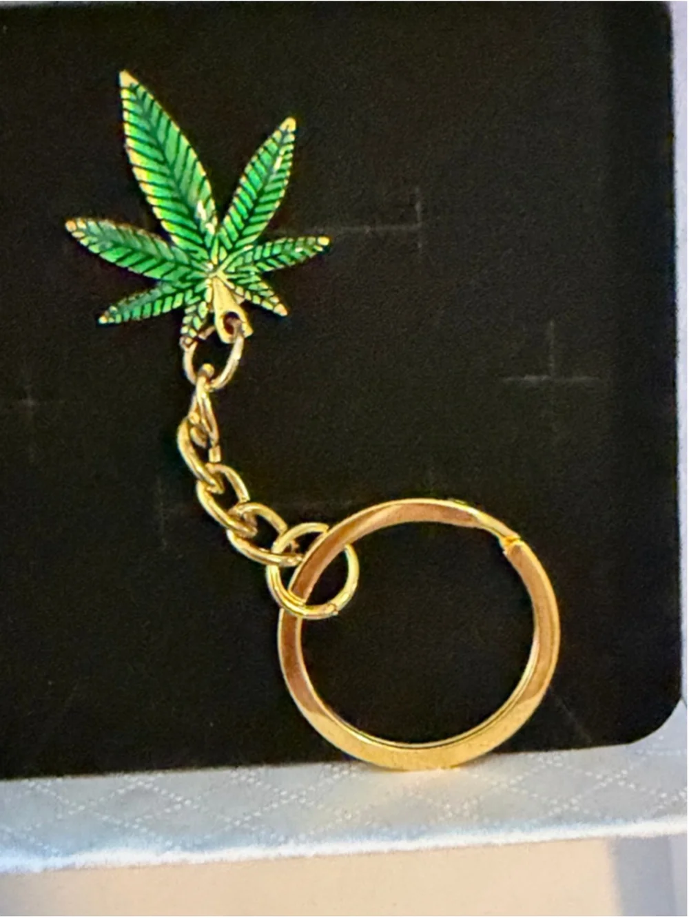 Aura’s Oddities “Maple Leaf” Mary Jane green and gold key chain in a gift box